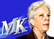 Карла дель Понти и логотип МК